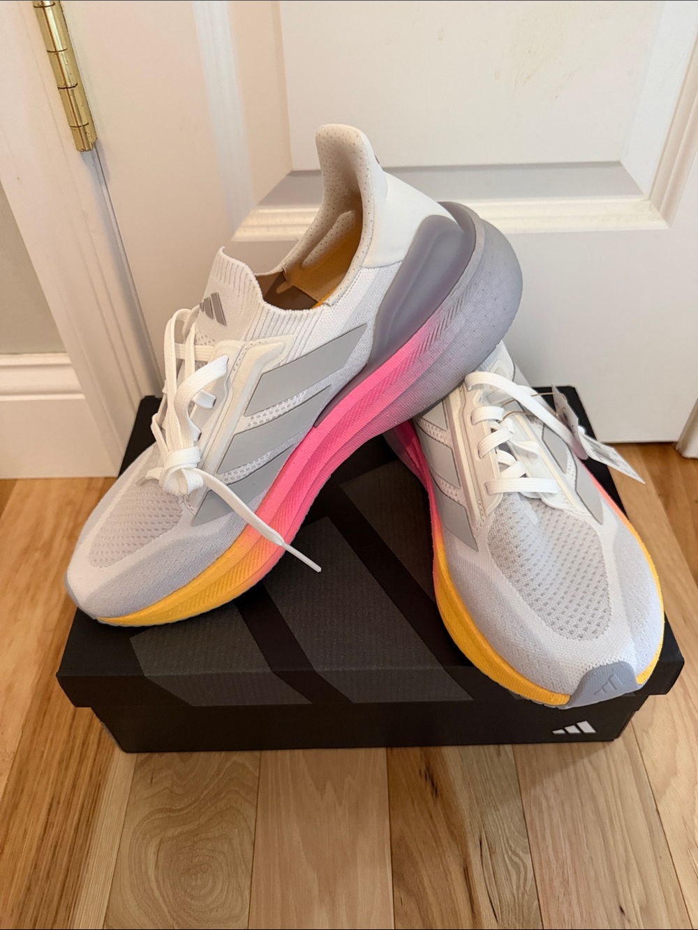 adidas Ultraboost Women's White Running Shoes with Pink and Yellow Accents